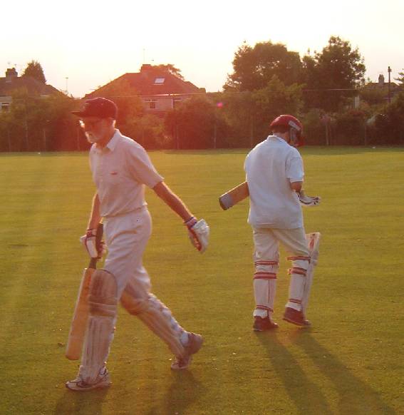 Mike Sneyd walking back to the pavilion.